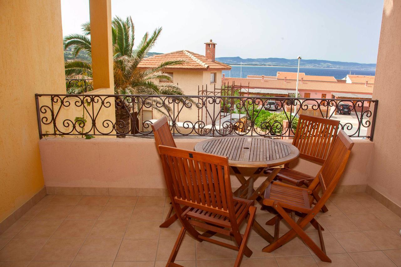 Aparthotel A.I.R. Isola Rossa Borgo Di Mare Exterior foto